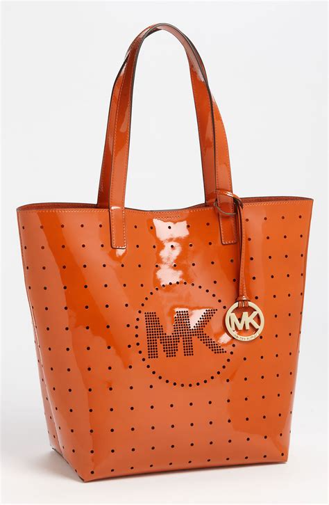 michael kors burnt orange bags|Michael Kors orange totes.